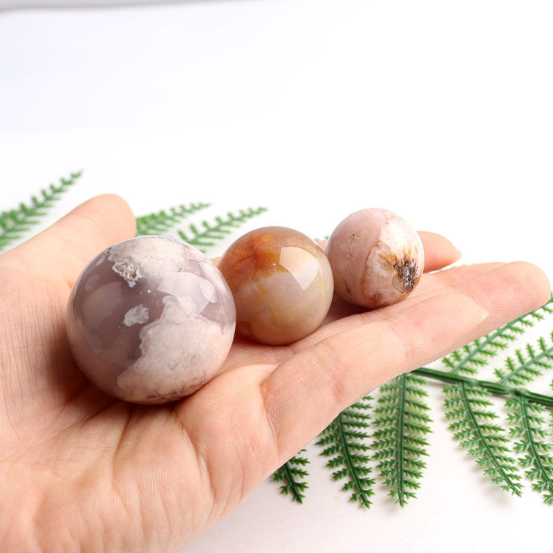 small cherry blossom agate crystal sphere