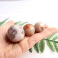 small cherry blossom agate crystal sphere